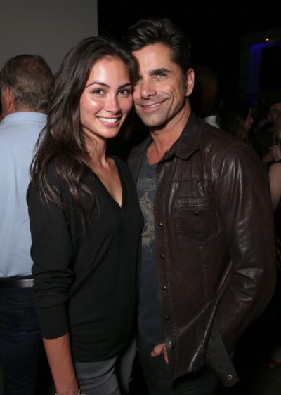 John Stamos and Caitlin McHugh