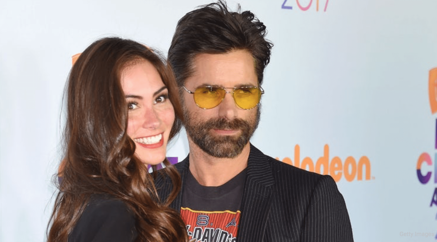 John Stamos and Caitlin McHugh